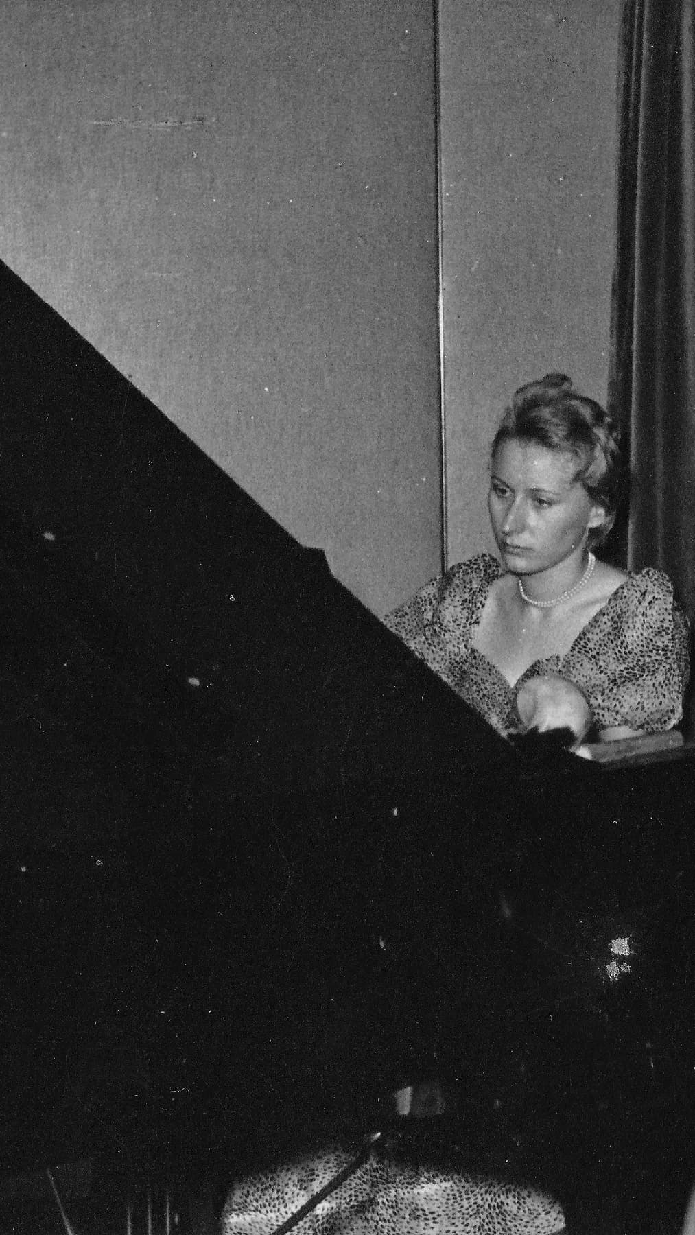 Clara playing the piano, archive photo